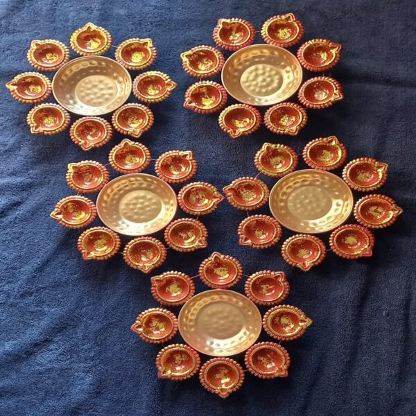 Flower-shaped diya urli cultural masterpiece