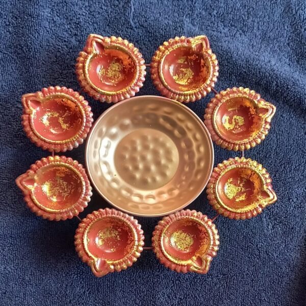 Flower-shaped diya urli